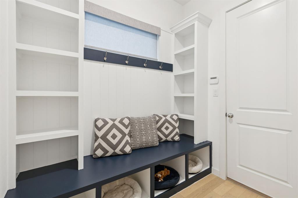 547 Embargo Drive Fate, TX 75189 - Photo 18 of 36 a view of walk in closet with clothes and shoes