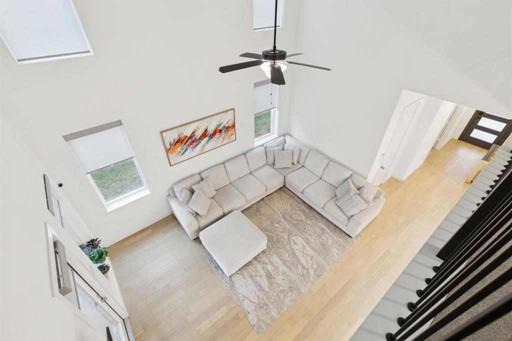547 Embargo Drive Fate, TX 75189 - Photo 21 of 36 a living room with a couch