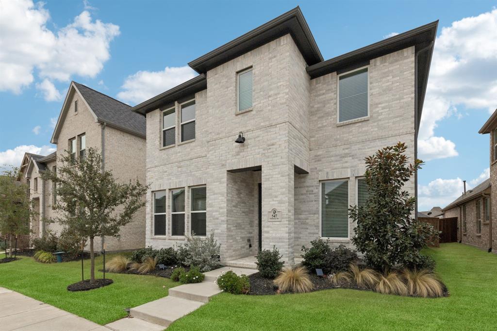 547 Embargo Drive Fate, TX 75189 - Photo 3 of 36 a front view of a house with garden