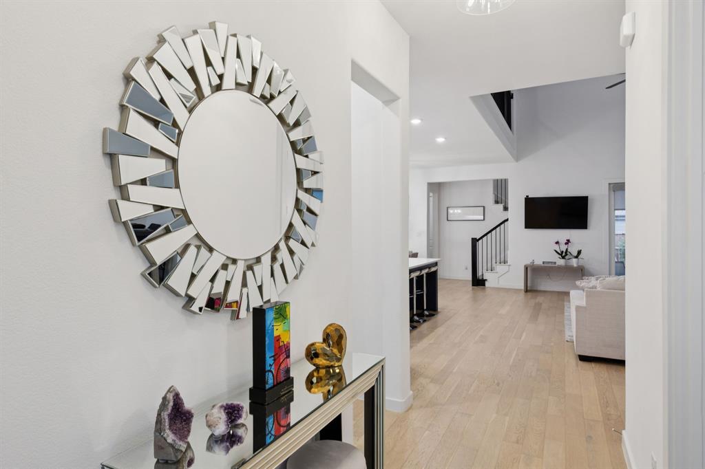547 Embargo Drive Fate, TX 75189 - Photo 5 of 36 an entryway with a livingroom and a livingroom with furniture