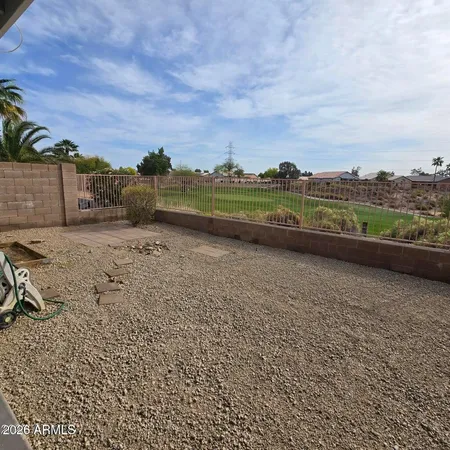 a view of a road with a yard