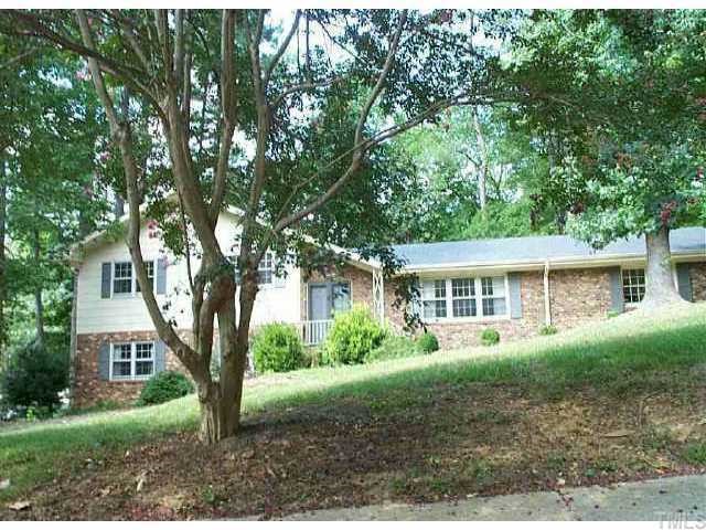 428 Northbrook Drive Raleigh, NC 27609 - Photo 1 of 1 front view of a house with a tree in a yard