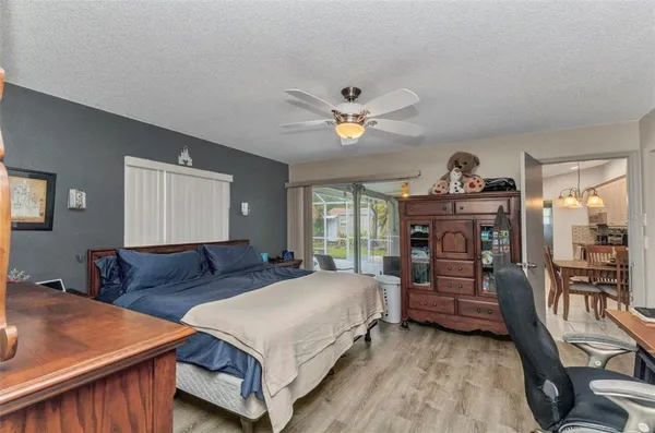 a bedroom with a bed and furniture