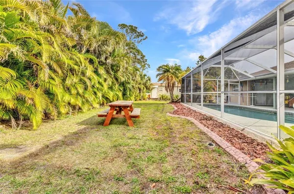 a view of a swimming pool with an outdoor space