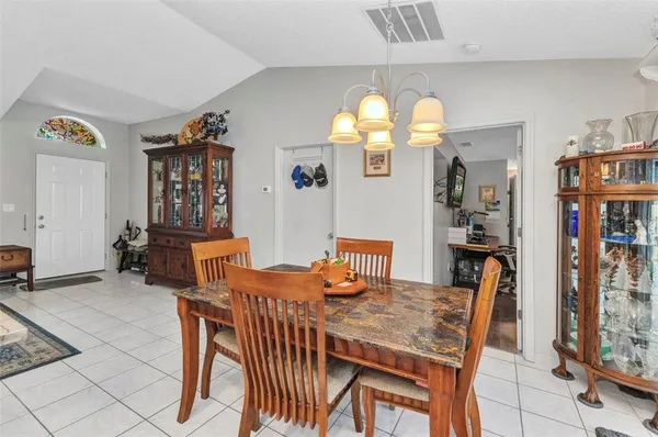 a view of a dining room with furniture