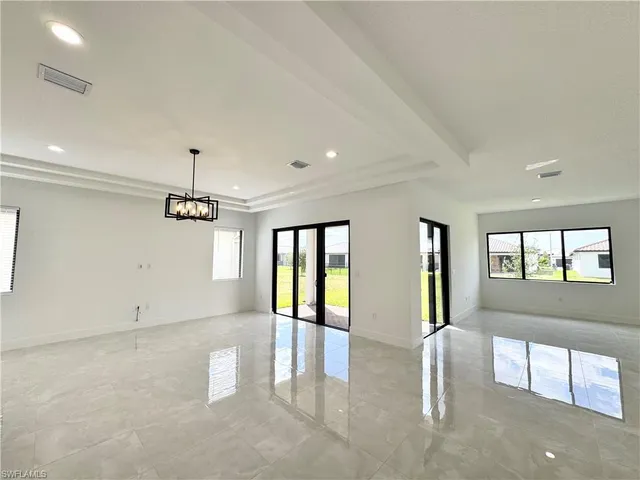 a view of kitchen with furniture and window