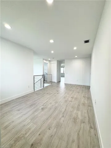 a view of entryway with wooden floor