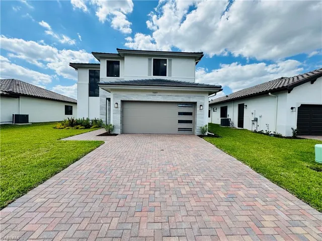a front view of house with yard