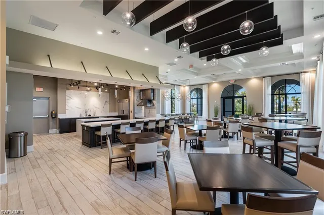 a front view of residential houses with yard