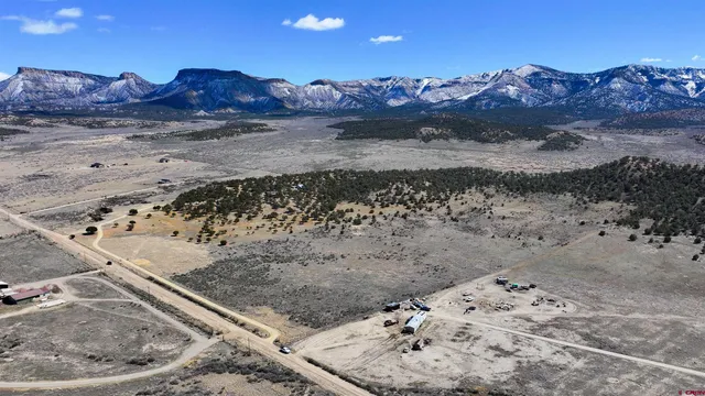 a view of a lake with mountains in the background