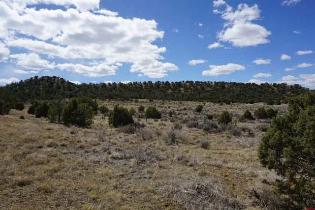 a view of mountain with sunset view