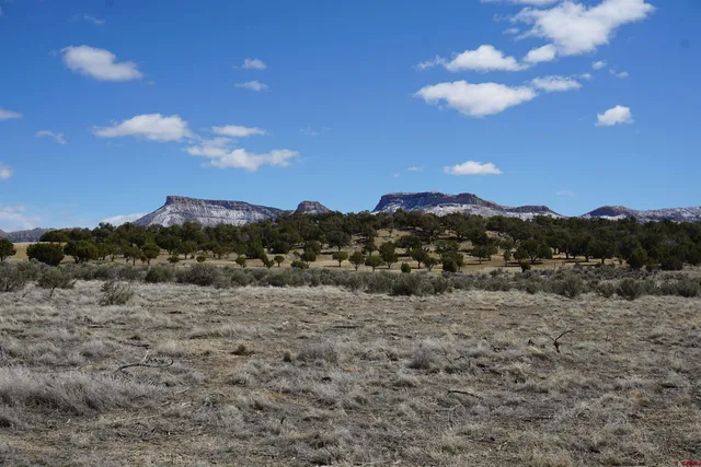 a view of a lake and sunset
