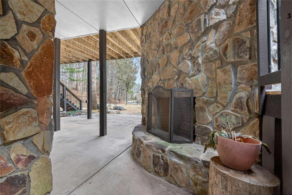1951 Swords Trail Buckhead, GA 30625 - Photo 16 of 102 a living room with furniture and a fireplace