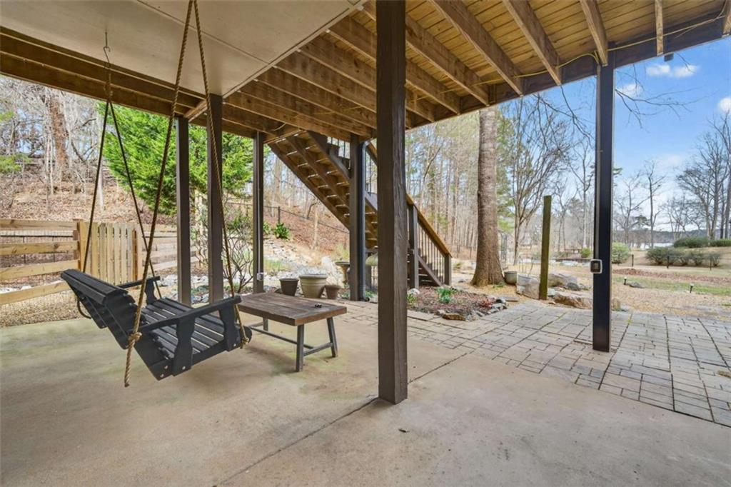 1951 Swords Trail Buckhead, GA 30625 - Photo 18 of 102 a view of a patio with a table chairs and a patio