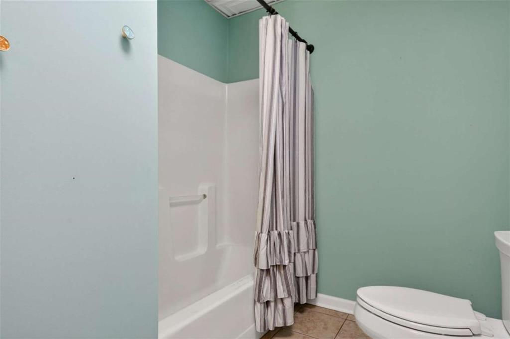 1951 Swords Trail Buckhead, GA 30625 - Photo 20 of 102 a bathroom with a toilet and a shower