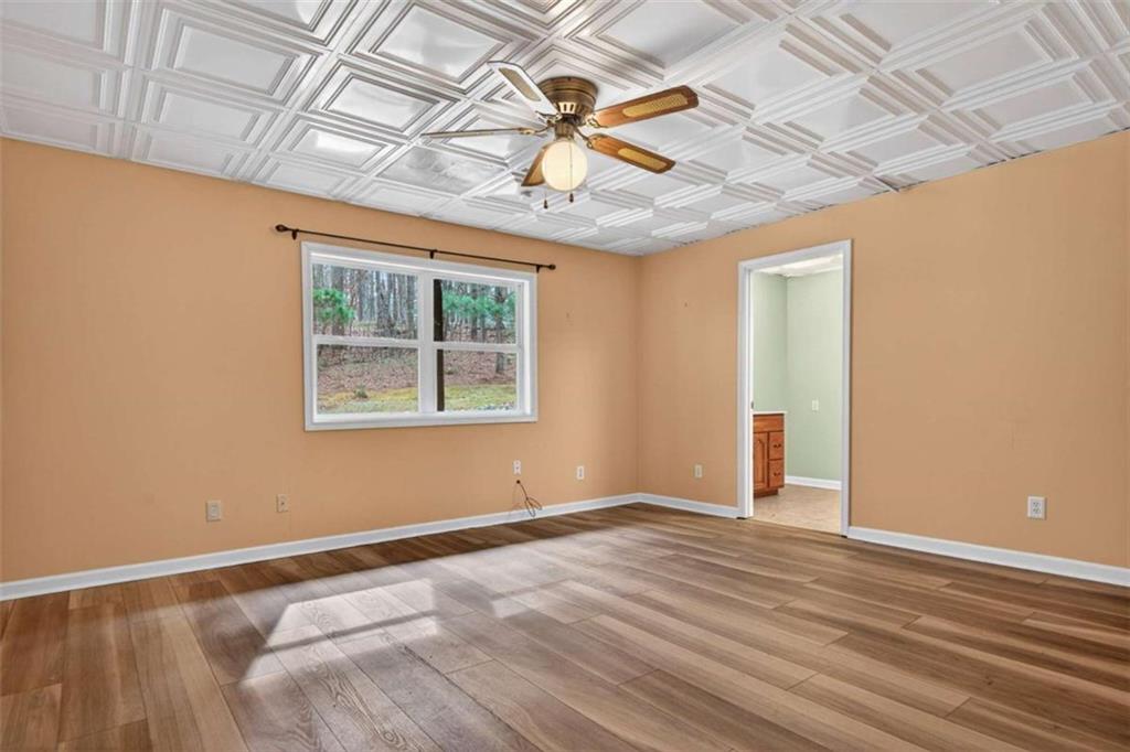 1951 Swords Trail Buckhead, GA 30625 - Photo 25 of 102 a view of empty room with wooden floor and fan