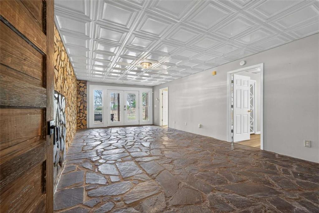 1951 Swords Trail Buckhead, GA 30625 - Photo 28 of 102 a view of an empty room with a windows