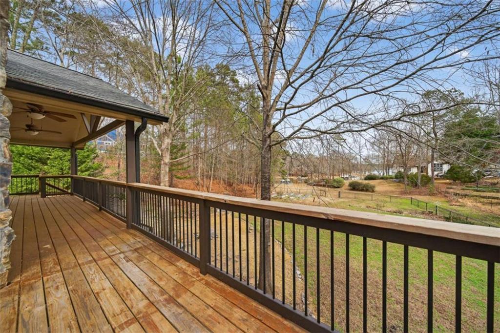 1951 Swords Trail Buckhead, GA 30625 - Photo 45 of 102 a view of balcony with wooden floor and fence
