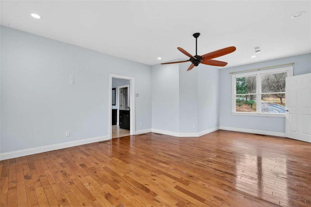 1951 Swords Trail Buckhead, GA 30625 - Photo 53 of 102 wooden floor in an empty room with a window