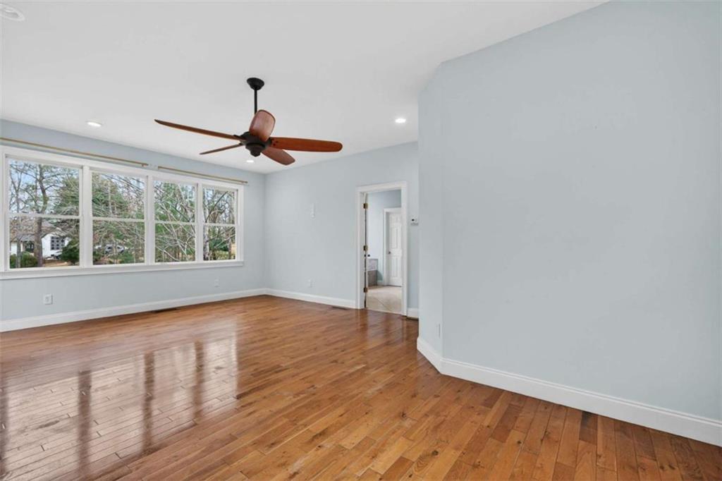 1951 Swords Trail Buckhead, GA 30625 - Photo 56 of 102 a view of empty room with wooden floor and fan