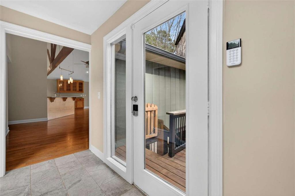 1951 Swords Trail Buckhead, GA 30625 - Photo 57 of 102 a view of a hallway with wooden floor and dining room