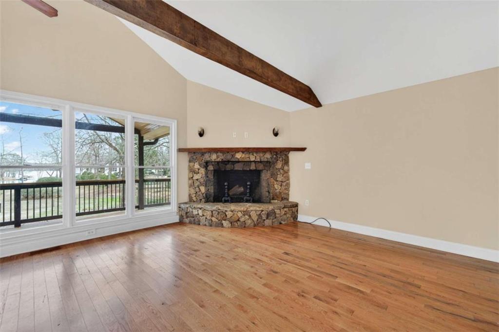 1951 Swords Trail Buckhead, GA 30625 - Photo 63 of 102 a view of an empty room with wooden floor and a window