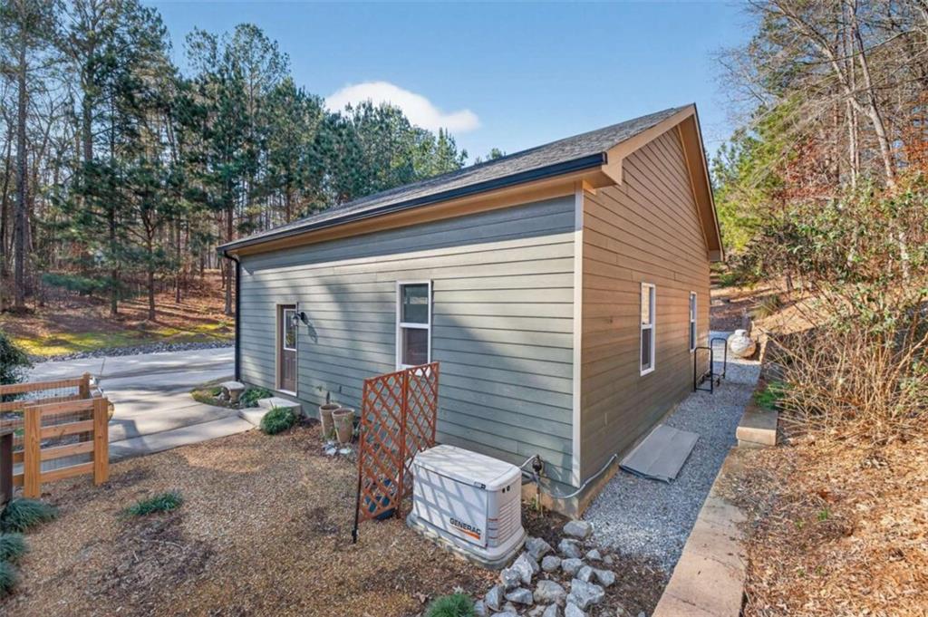 1951 Swords Trail Buckhead, GA 30625 - Photo 94 of 102 a view of a chair and table in the back yard