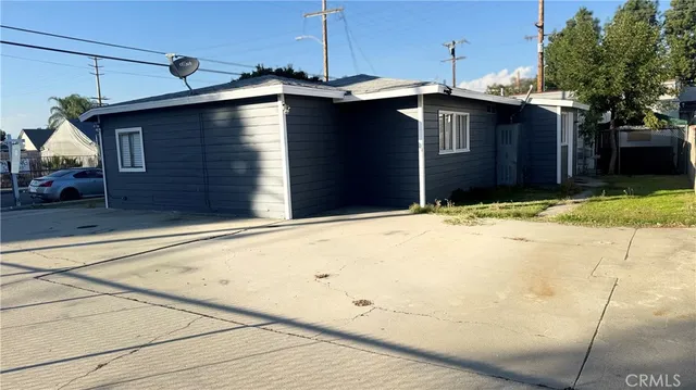 a house with trees in front of it