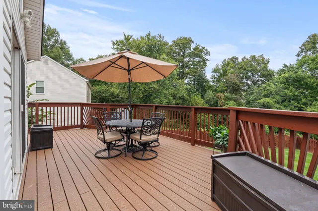 swimming pool view with a seating space