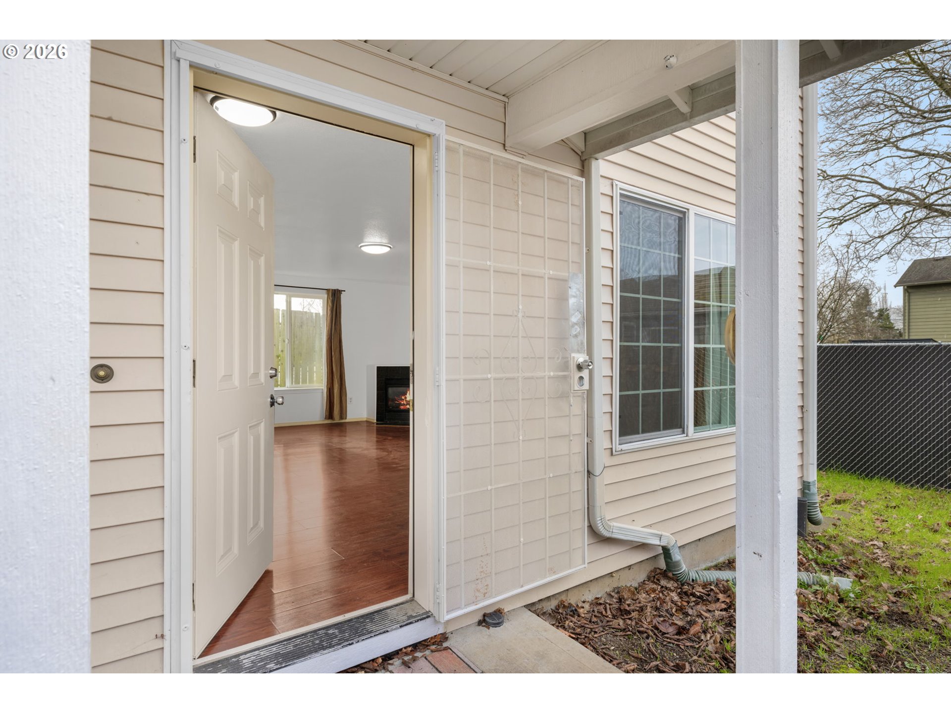 8704 Southeast Rhone Street Portland, OR 97266 - Photo 3 of 24 a view of a front door of the house
