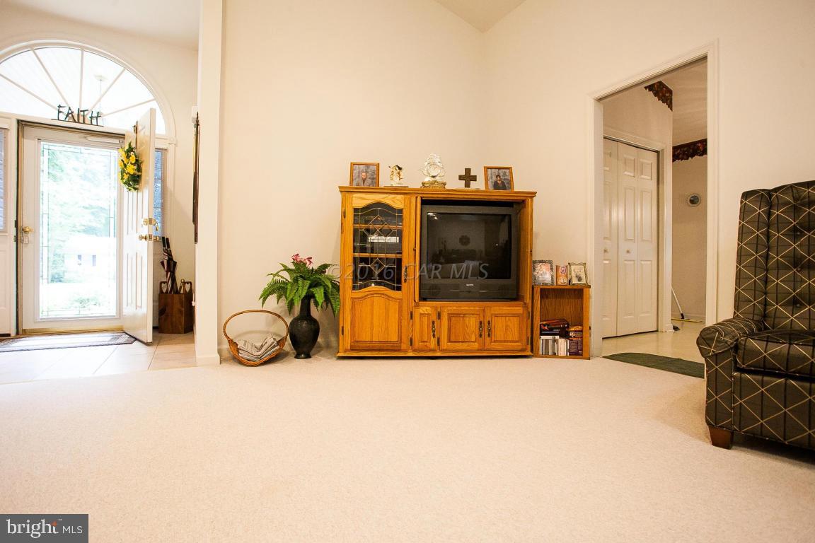 133 Pinehurst Road Berlin, MD 21811 - Photo 17 of 112 a view of livingroom with furniture and windows