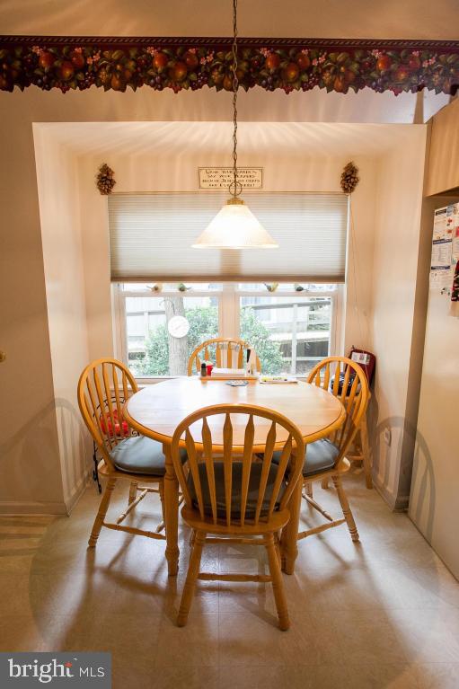 133 Pinehurst Road Berlin, MD 21811 - Photo 19 of 112 a dining room with furniture and window
