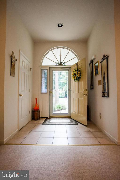 133 Pinehurst Road Berlin, MD 21811 - Photo 3 of 112 a view of a hallway with wooden floor and a living room