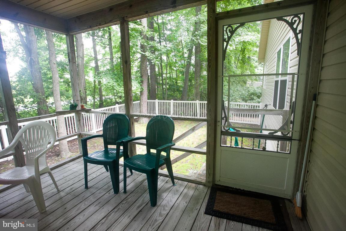 133 Pinehurst Road Berlin, MD 21811 - Photo 38 of 112 a view of a dining room with furniture window and outside view
