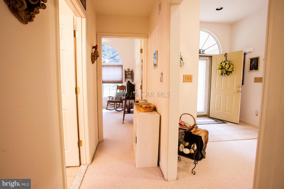 133 Pinehurst Road Berlin, MD 21811 - Photo 39 of 112 a view of a livingroom with furniture and a ceiling fan