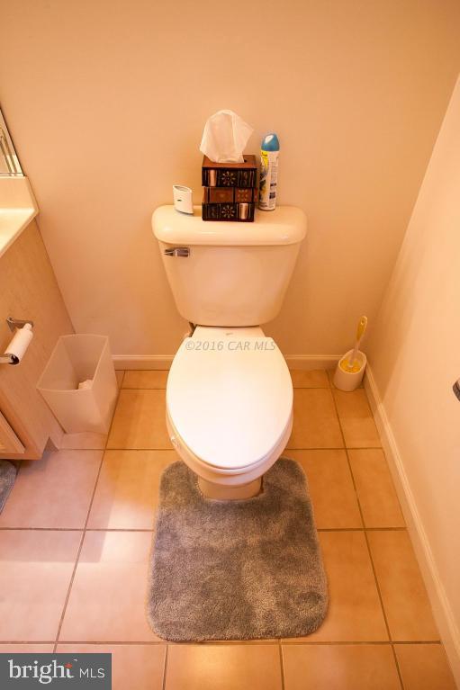 133 Pinehurst Road Berlin, MD 21811 - Photo 66 of 112 a bathroom with a toilet and a mirror