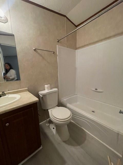 3125 Bois D Arc Road Combine, TX 75159 - Photo 9 of 15 Full bathroom with bathing tub / shower combination, vanity, a textured ceiling, and toilet