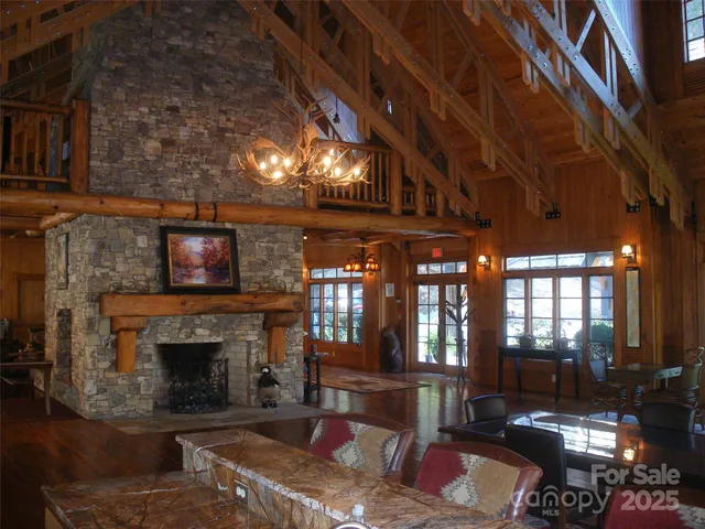 a living room with fireplace furniture and a fireplace