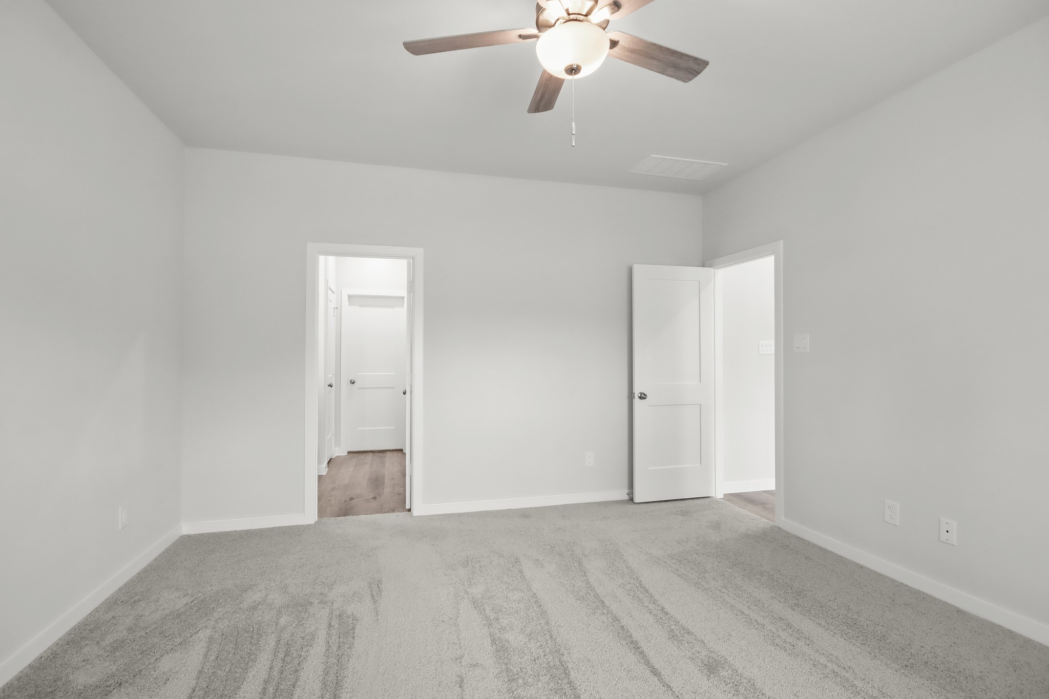 225 Spring Drive Hockley, TX 77447 - Photo 11 of 24 wooden floor in an empty room