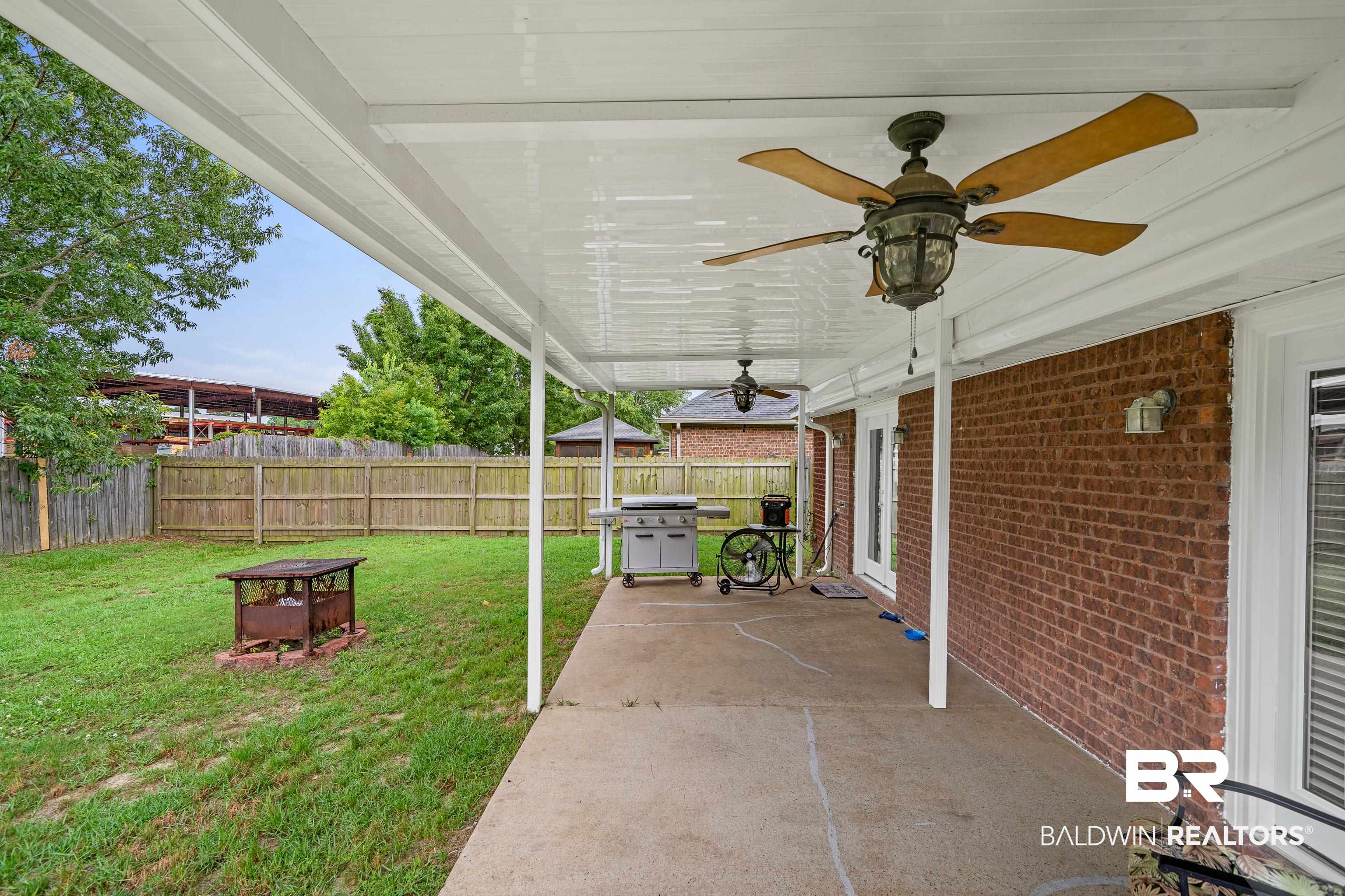 9552 Collier Loop Daphne, AL 36526 - Photo 24 of 28 View of covered patio featuring area for grilling and ceiling fan