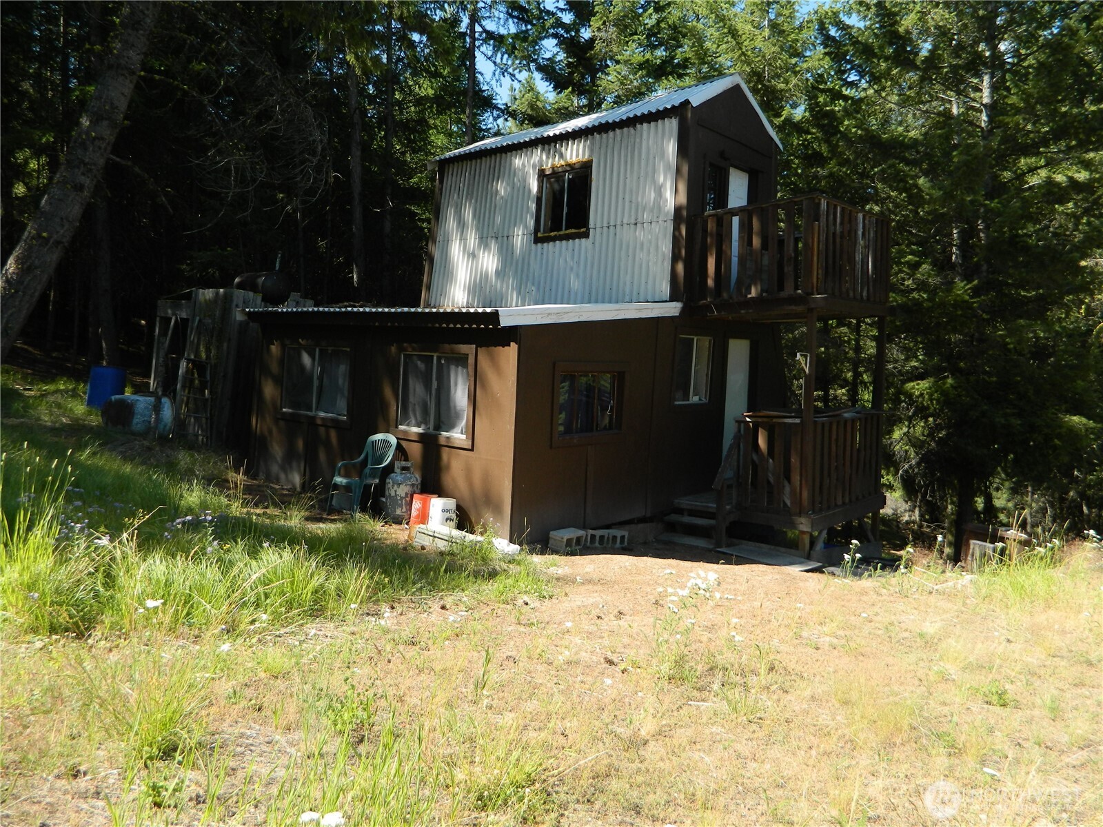 0 Tbd Snowbunny Ridge Drive Tonasket, WA 98855 - Photo 4 of 21 a view of a house with backyard and trees