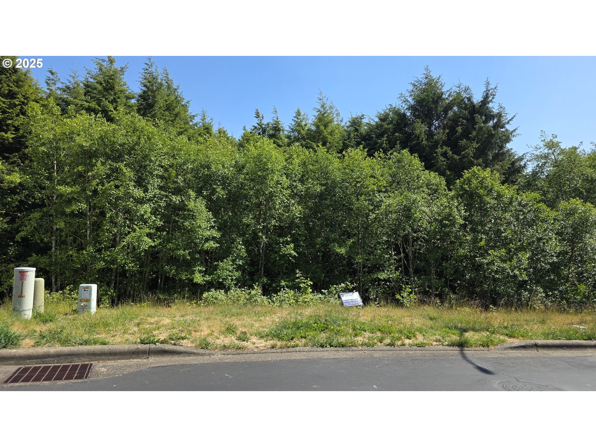 Sequoia Loop, Unit 145 Tillamook, OR 97141 - Photo 2 of 10 a black and white photo of a house