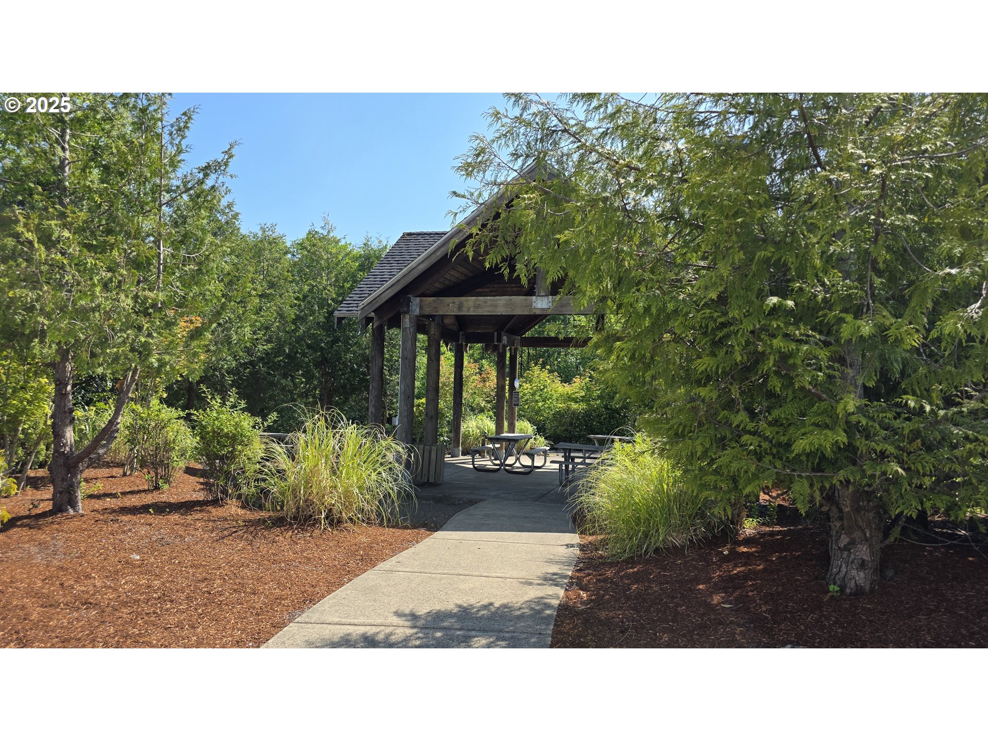 Sequoia Loop, Unit 145 Tillamook, OR 97141 - Photo 4 of 10 a black and white photo of a garden
