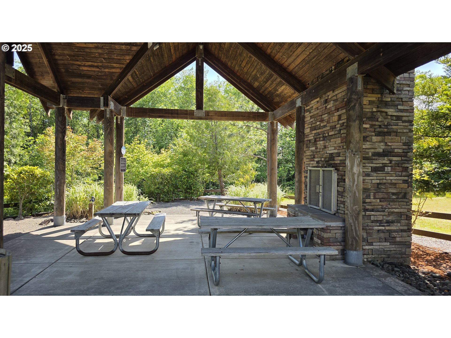 Sequoia Loop, Unit 145 Tillamook, OR 97141 - Photo 5 of 10 a kitchen with a table and chairs