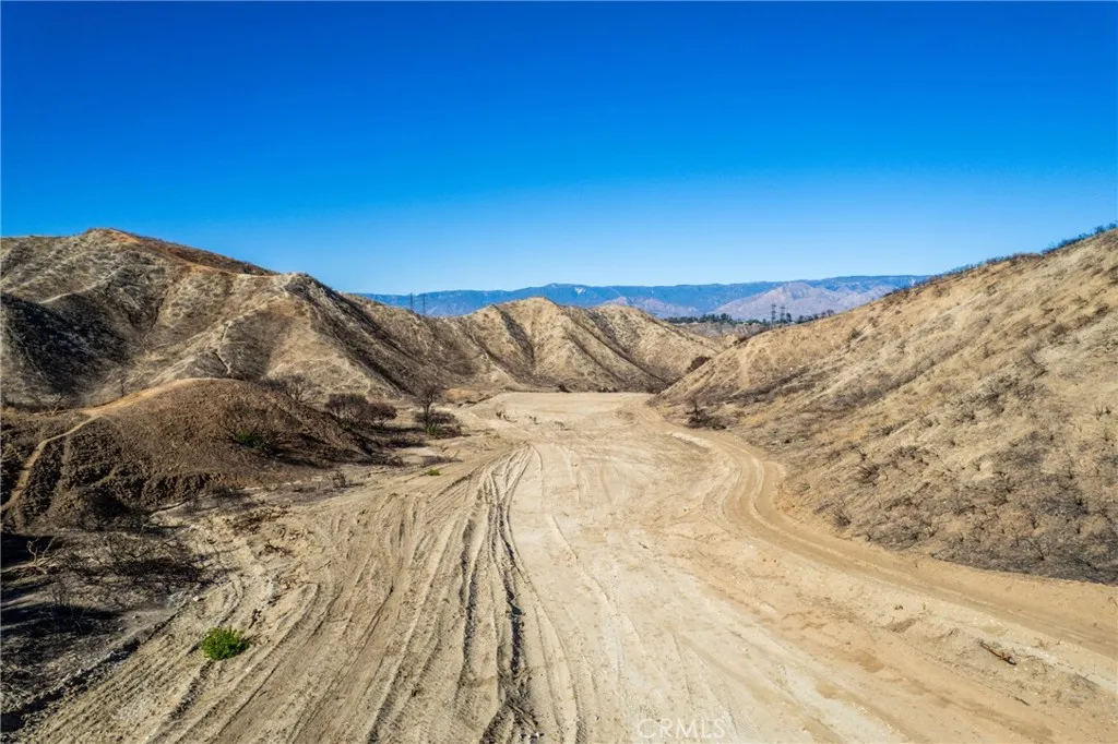 0 Smiley Redlands, CA 92373 - Photo 9 of 18 a view of a dry yard with mountains in the background