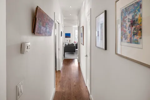 a bedroom with bed and a window