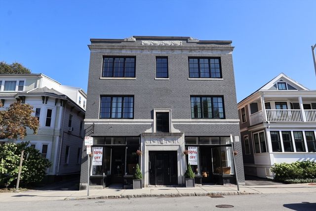 a front view of a building with street