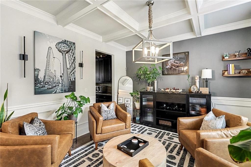 7284 Demeter Atlanta, GA 30349 - Photo 2 of 33 a living room with furniture and a chandelier