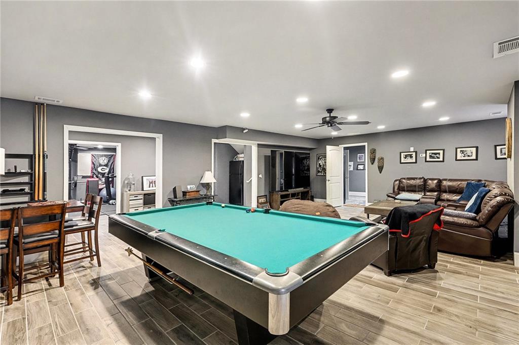 7284 Demeter Atlanta, GA 30349 - Photo 31 of 33 a room with pool table and windows