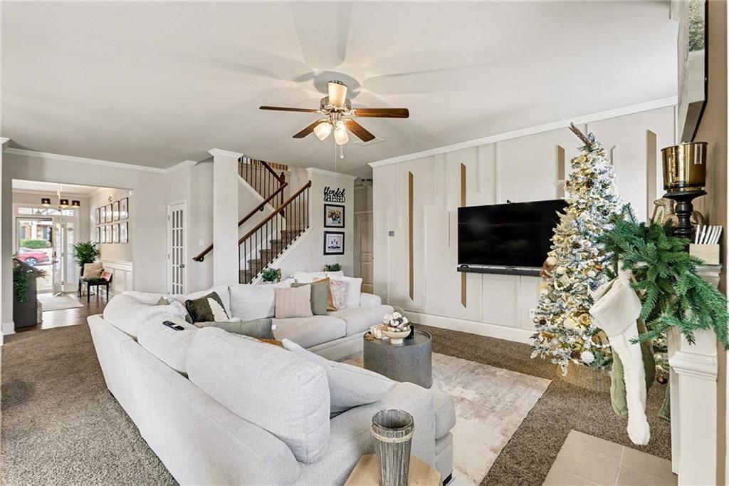 7284 Demeter Atlanta, GA 30349 - Photo 10 of 33 a living room with furniture and a flat screen tv